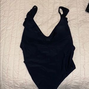 One piece low bag scoop sides ruffle bathing suit